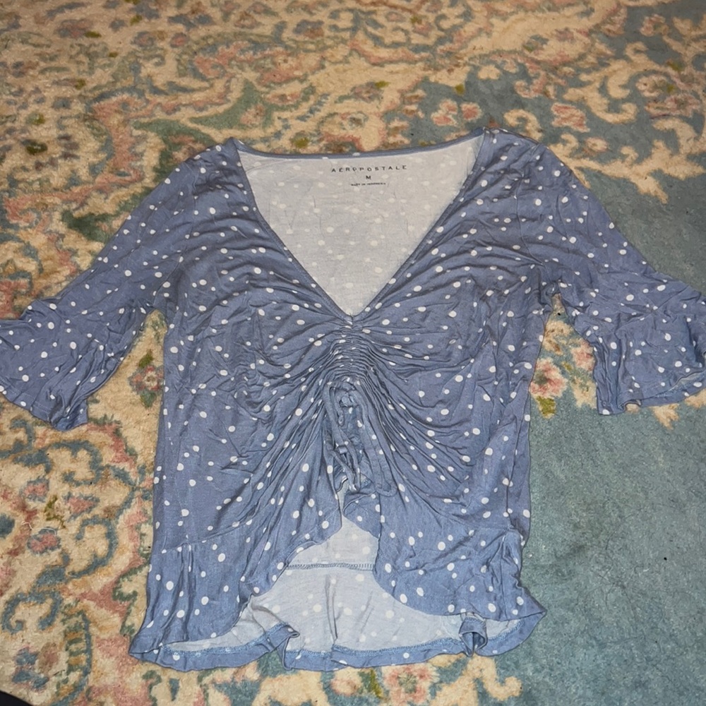 Cropped sleeve shirt